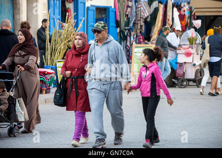 Essaouira, Morocco.  Family Walking in Avenue de l'Istiqlal. Stock Photo