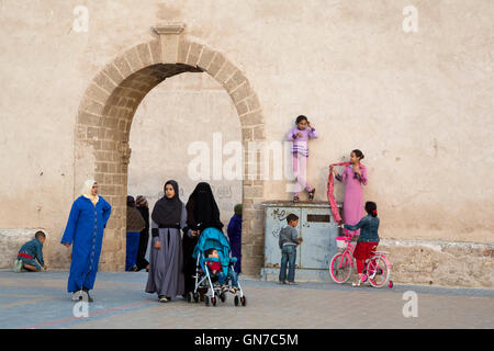 Essaouira, Morocco.  The Younger and Older Generations as Revealed in Veiling and Face-covering, Place Moulay Hassan. Stock Photo