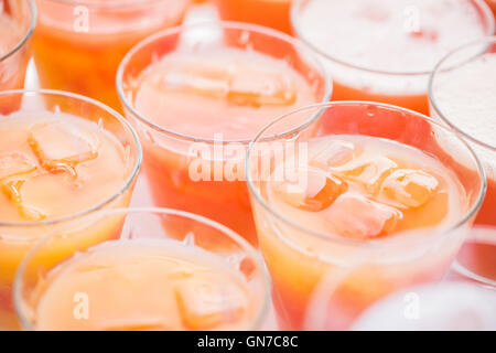 Colorful cocktails close up. an open-air party. orange and ice. Stock Photo