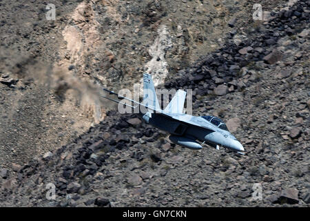 US Navy McDonnell Douglas F/A-18C Hornet NA-401 (USN 164252) from Strike Fighter Squadron 94 (VFA-94), Naval Air Station Lemoore, the 'Mighty Shrikes' flies through the Jedi Transition, R-2508 complex, Star Wars Canyon / Rainbow Canyon, Death Valley Natio Stock Photo