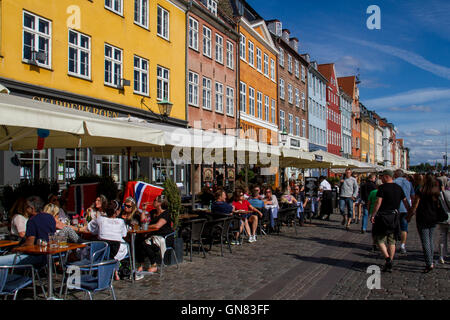 Nyhavn, the colourful waterfront, canal and entertainment district in Copenhagen, Denmark Stock Photo