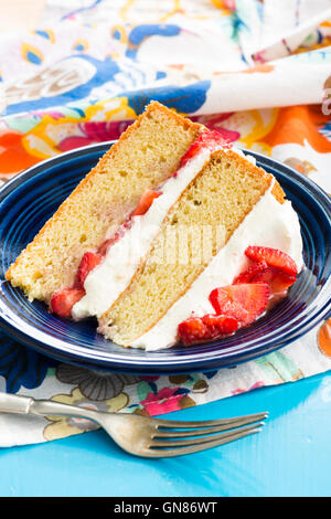 CAKE SLICE WITH STRAWBERRIES Stock Photo
