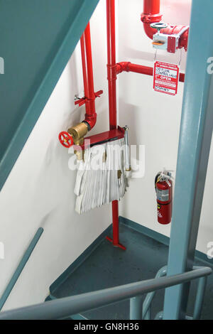 Standpipe Firefighting Equipment in Stairwell Stock Photo