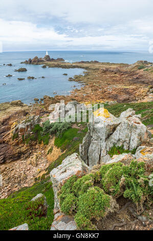 The lighthouse at La Corbière is the extreme south-western point of Jersey in St. Brelade. Stock Photo
