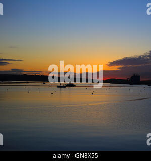 Sunrise over the Carrick Roads at high tide, Falmouth, Cornwall, England, UK. Stock Photo