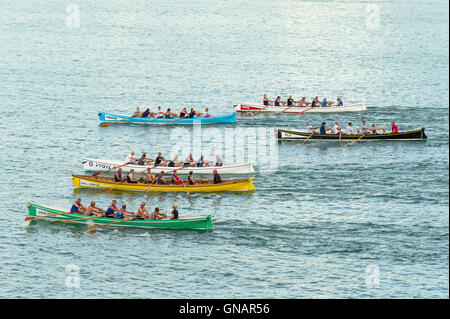 A traditional Cornish Pilot Gig race in Newquay, Cornwall. Stock Photo