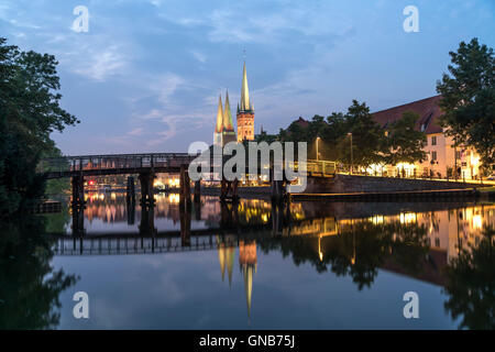 old town and river Trave at dusk, Lübeck, Schleswig-Holstein, Germany Stock Photo