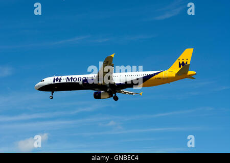 Monarch Airlines Airbus A321 approaching Birmingham Airport, UK (G-OZBN) Stock Photo