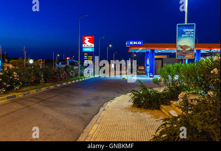 ATHENS, GREECE - JUNE 08, 2009: Night gas station on the road to capital city Stock Photo