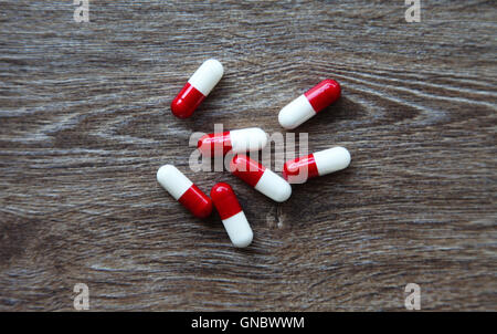 Medicine Drug Pills on a wood table Stock Photo