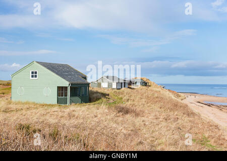 Holiday chalets overlooking Embleton Bay, Northumberland, England, UK Stock Photo