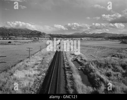 Railroad Tracks with Sawatch Mountains in Background, near Buena Vista, Colorado, Marion Post Wolcott for Farm Security Administration, September 1941 Stock Photo