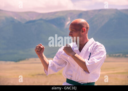 combat karate rack in the mountains Stock Photo