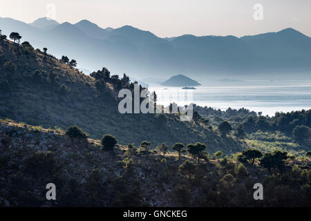 Looking across to Lake Shkodra from Rozafa Castle with the mountains of Montinegro in the background, Shkodra, Northern Albania. Stock Photo