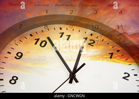 Clock and calendar in bright sky Stock Photo