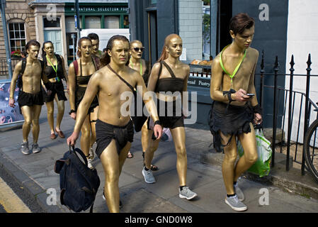 Edinburgh in August: it's not unusually to come across a theatre group in costume making their way to or from a performance! Stock Photo