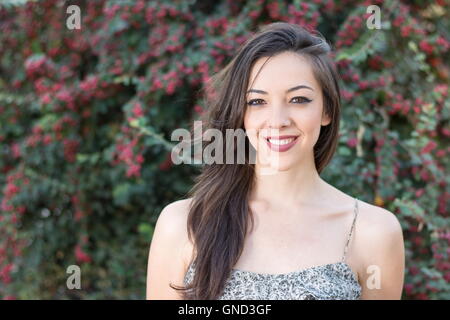 Portrait of a fashionable young woman outdoors Stock Photo