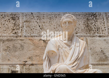 Athenian playwright of the New Comedy, in front of retaining wall of the auditorium at the east side of the Theater of Dionysos. Stock Photo