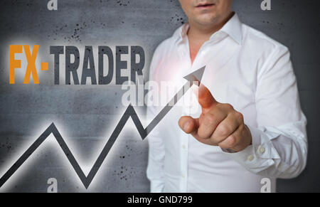 fx trader touchscreen is operated by man. Stock Photo