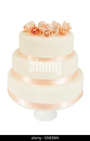 Wedding cake with rose decoration. Cut out and isolated on a white background Stock Photo