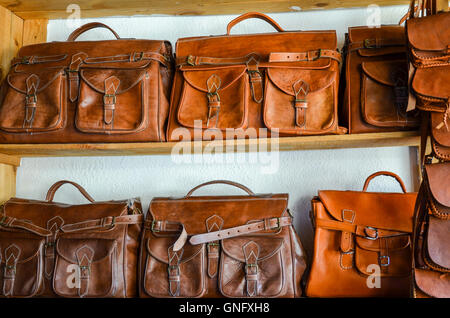 Vintage handmade leather bags sold in medina of Fez, Morocco Stock Photo