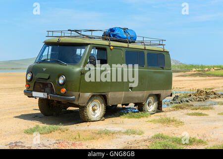 UAZ-452 drove the dirt. Opuksky Reserve is located on the southern coast of Kerch Peninsula. Stock Photo