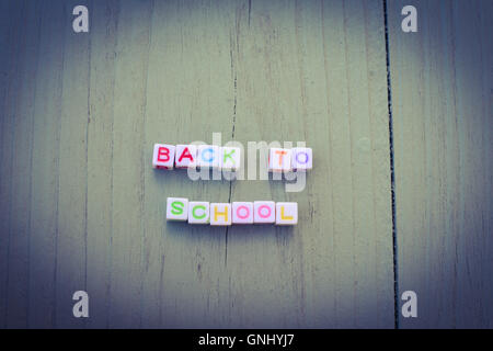 back to school plastic letters on wooden background Stock Photo