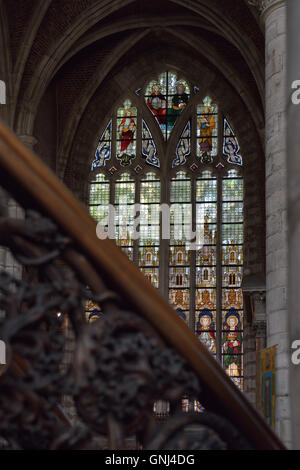 Historical stained glass window in St. Michiels church in Ghent, Belgium, on July 19, 2016 Stock Photo