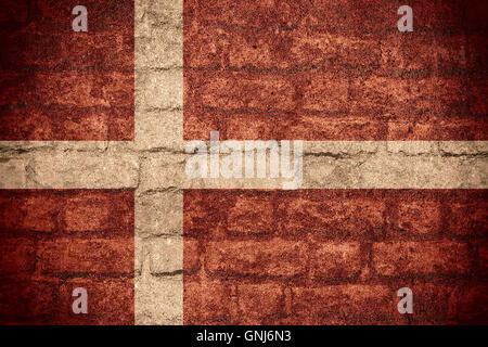 flag of Denmark or Danish banner on brick texture Stock Photo