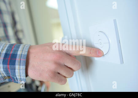 Controlling temperature in home Stock Photo