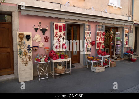 Shop selling pottery, gifts, presents, souvenirs in the traditional medieval village of Aigues-Mortes in Camargue, Southern Fran Stock Photo