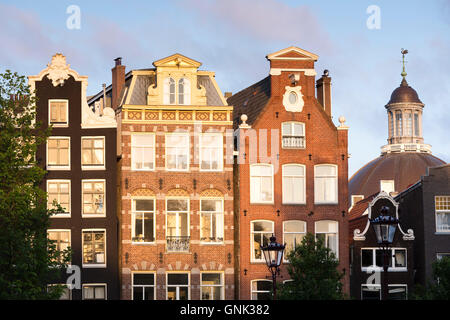 Gables of traditional Dutch architecture of canalside buildings in Prinsengracht, Amsterdam, Holland Stock Photo