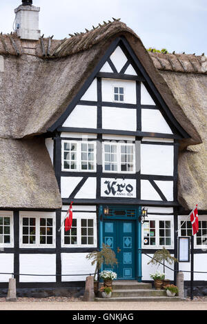 Vester Skerninge Kro, an ancient 18th Century inn half-timbered thatched hotel on Funen, Denmark Stock Photo