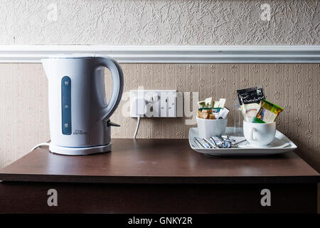 Detail of typical basic tea and coffee making facilities in old fashioned guest house in Scotland, United Kingdom Stock Photo