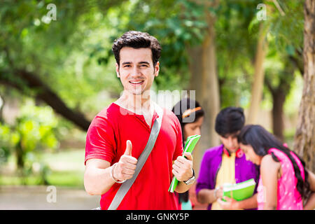 1 Young  Boy College Student Park Standing Thumbs up Showing Stock Photo