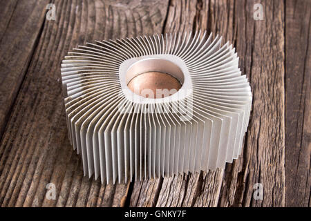 Aluminum cpu cooler heat sink on wooden background Stock Photo