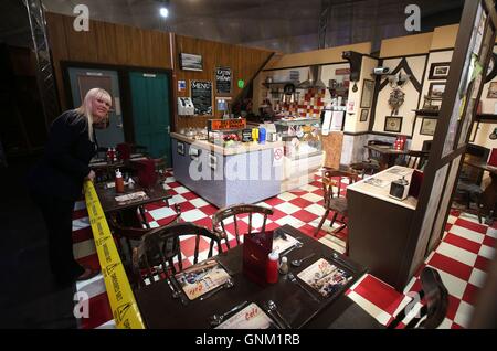 Laura Paterson views the set of Roy's Rolls at the SECC in Glasgow , part of the Coronation Street On Tour. Stock Photo