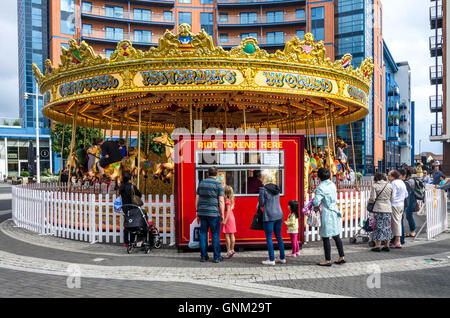 A merry-go-round situated at Gunwharf Quays in Portsmouth, UK. Stock Photo