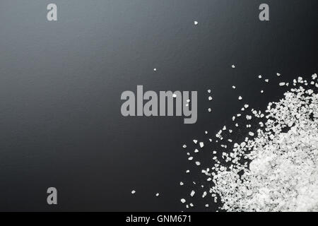 white crystallized salt on black background Stock Photo