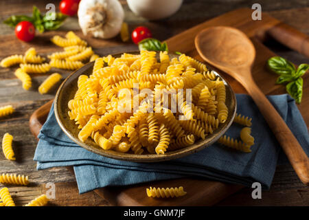 Raw Dry Organic Fusilli Pasta Ready for Cooking Stock Photo