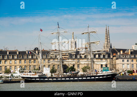 Garonne River, historic sailing ship and historical center of Bordeaux, Gironde. Aquitaine France Europe Stock Photo
