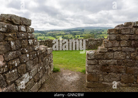 Cumbria, England, UK.  View from within  Banks East Turret, Looking South, Hadrian's Wall.  Low Row Village in the Distance. Stock Photo