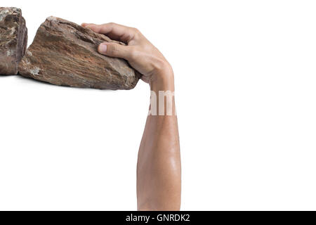 Hand clinging on rock Business concept Stock Photo