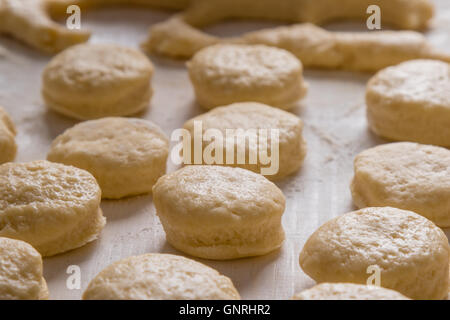 raw yellow scones dough on table before baking Stock Photo