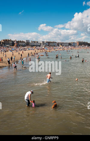 Crowded Weymouth beach Stock Photo