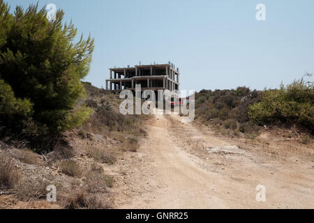 A fire engine sits at a new building in Zante Greece Stock Photo