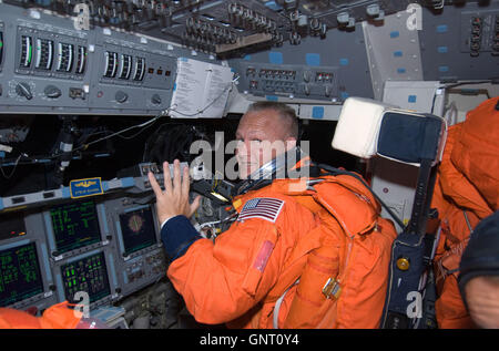 Space Shuttle Endeavour pilot Doug Hurley wearing his orange Launch and Entry Suit on the forward flight deck during STS-127 mission July 15, 2009 in Earth Orbit. Stock Photo