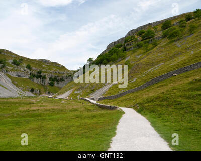 Footpath to Gordale Scar, a deep limestone gorge near the village of Malham in the Yorkshire Dales National Park Stock Photo