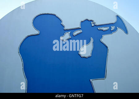 A silhouette of a man playing trumpet Stock Photo