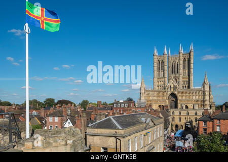 Historic City of Lincoln, UK, with Lincoln Cathedral in the background, and  Lincolnshire county flag in the foreground. Stock Photo
